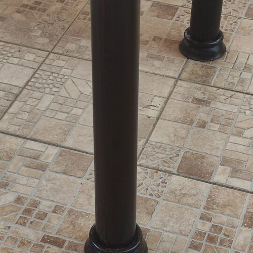 Table with solid iron base and solid teak wood top like new