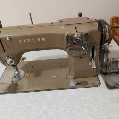 Singer sewing machine used with table in perfect condition