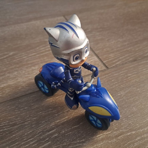 Catboy figure with vehicle used, authentic