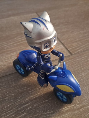 Catboy figure with vehicle used, authentic