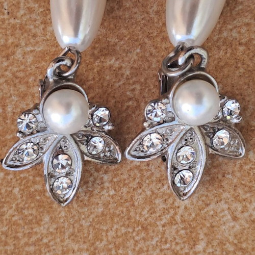 Vintage earrings with clips used, decorated with pearls and rhinestones