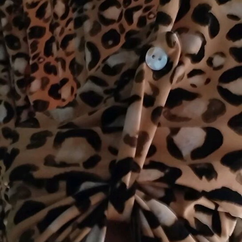 Leopard blouse used, size L, with zipper and adjustable sleeves