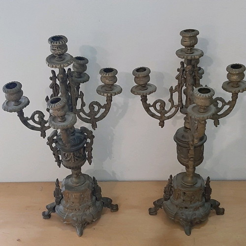 Bronze candlesticks used, pair with patina and carved base