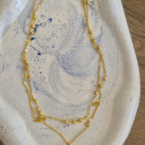 Gold double rosary-style necklace with cross, stainless steel