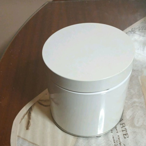 Metal vase with window