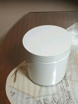 Metal vase with window