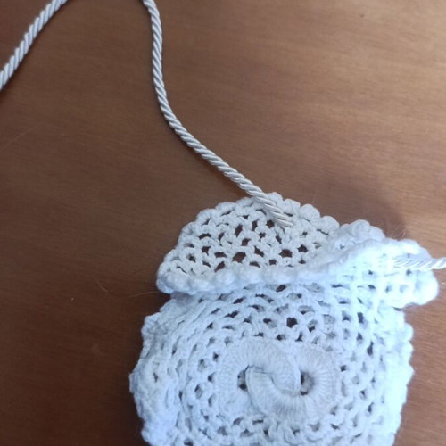 Small knitted pouch used, white