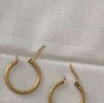 Iron golden rings with a twisted design.