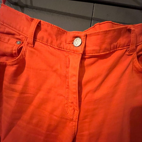Orange pants like new made of Italian fabric