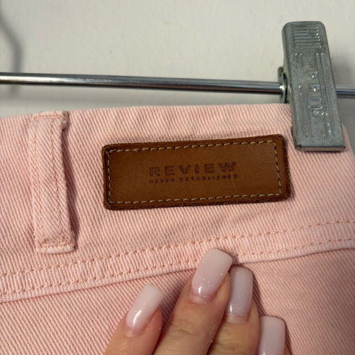 Review baby pink shorts like new, size XS