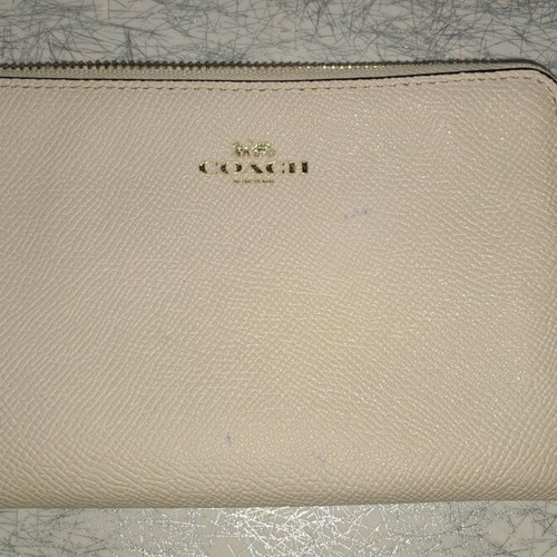 Coach wristlet bag used, beige with strap
