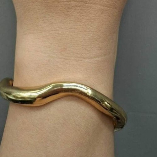 Gold-tone metal cuff bracelet, minimal design