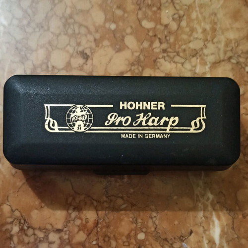 Hohner harmonica used with case