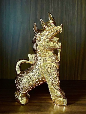 Wooden lion used with gold leaf from Thailand