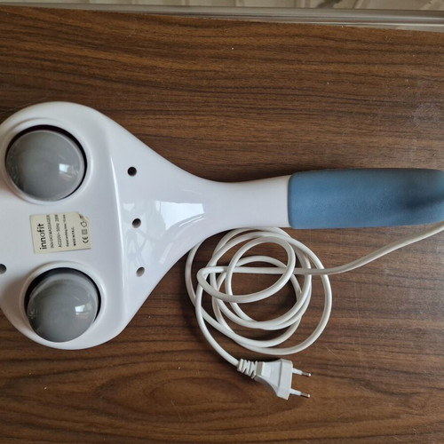 Innofit Hand Massager used with three interchangeable heads