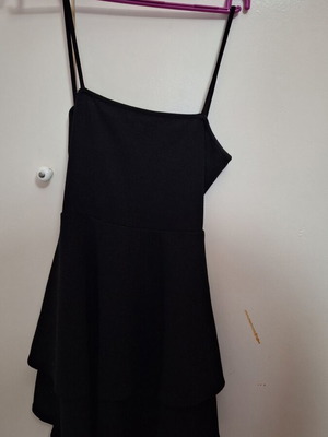 Black mini dress used with open back and double-layer ruffles, size S