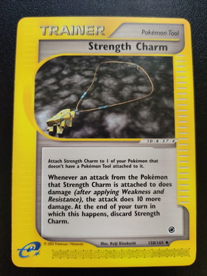 Trainer Strength Charm κάρτα μεταχειρισμένη από Expedition Base Set 2002