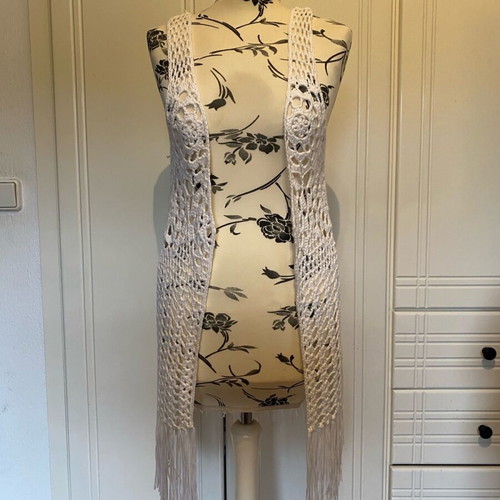 White sleeveless outerwear