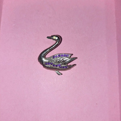 Swan brooch new, silver with purple details
