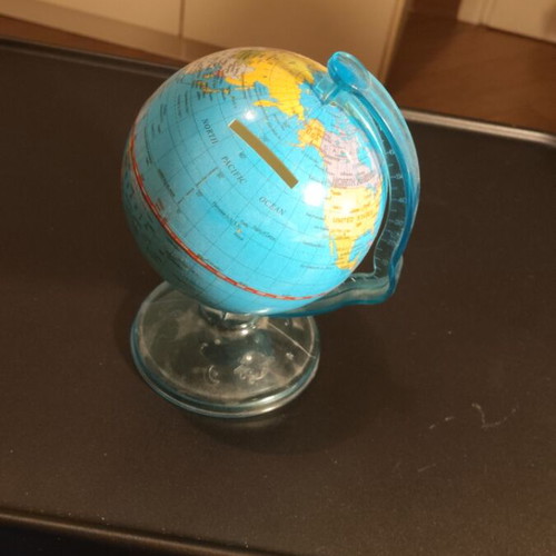 Globe moneybox like new