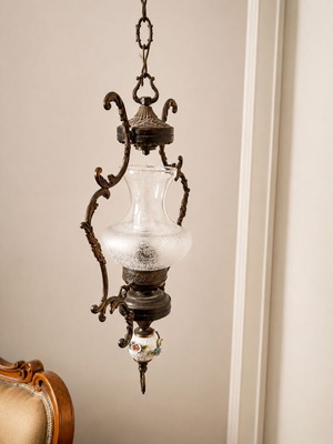 Victorian style brass hanging lamp with porcelain and glass shade