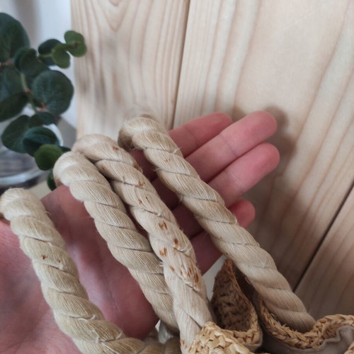 Boho straw backpack used with shells and rope straps, resort style