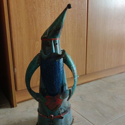Handmade decorative figure of a gnome from recycled iron like new