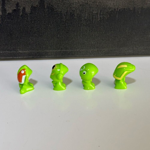 Go-Go’s Crazy Bones neon green mini figures like new collectible set