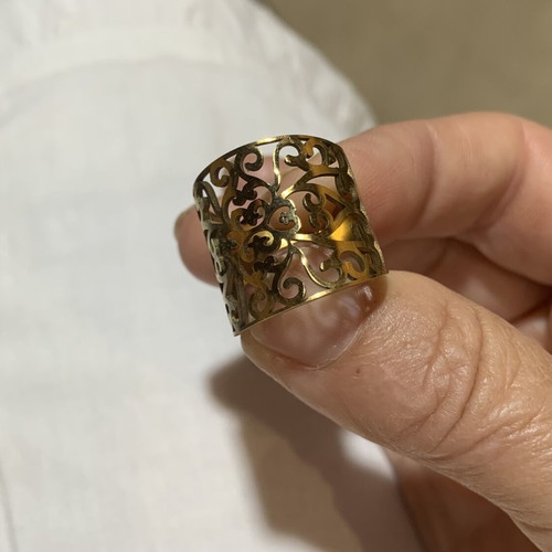 Gold stainless steel adjustable ring with intricate design