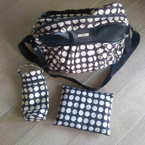 Changing bag used with minor wear on faux leather
