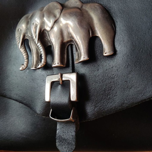 Leather crossbody bag used black with silver elephant buckle