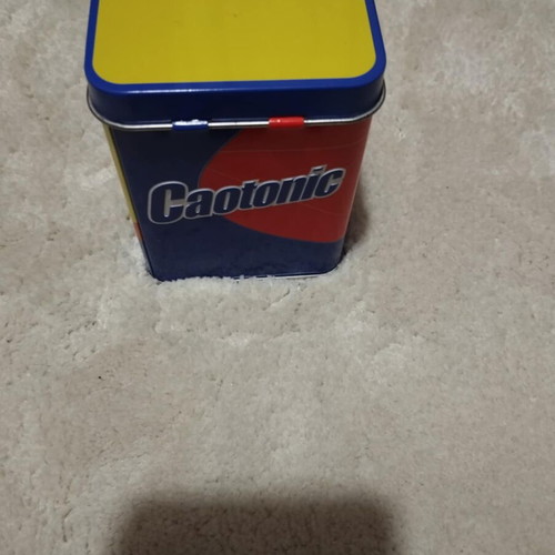 Caotoni tin money box like new, yellow with blue details
