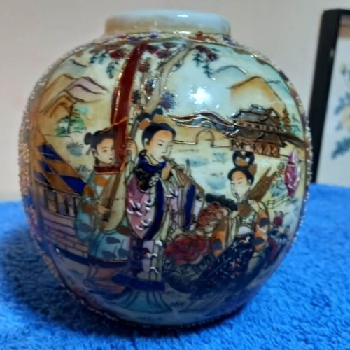 Satsuma vase used with handpainted floral motifs and crackle glaze