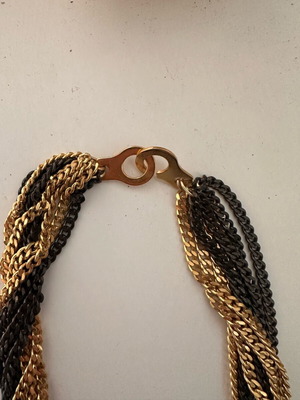 Necklace with intertwined chains like new, black and gold