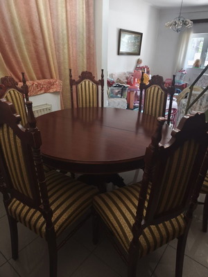 Round Dining Table with Its Chairs