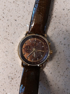 DKNY wristwatch women's used with brown glossy leather strap