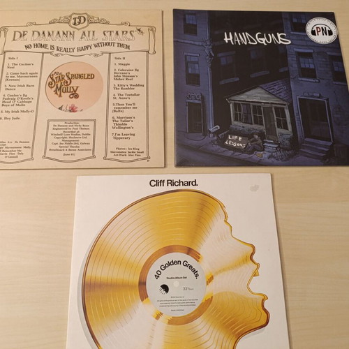 Collection of 4 vinyl records like new