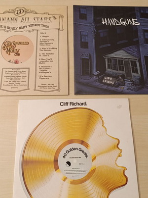 Collection of 4 vinyl records like new