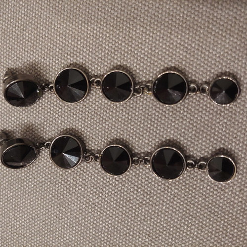 Long earrings unused with black stones