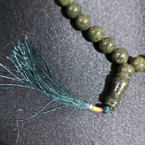 Decorative worry beads from semi-precious spiral stone