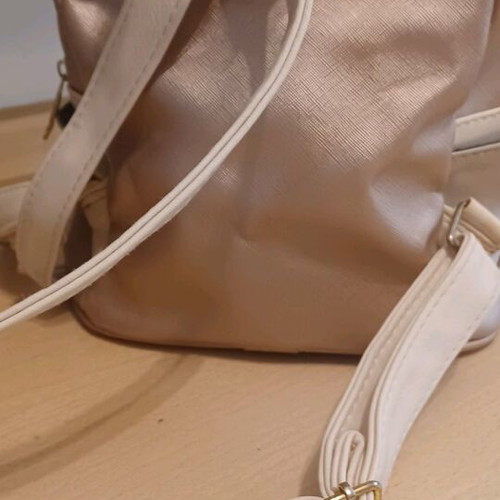 Small backpack used, beige gold