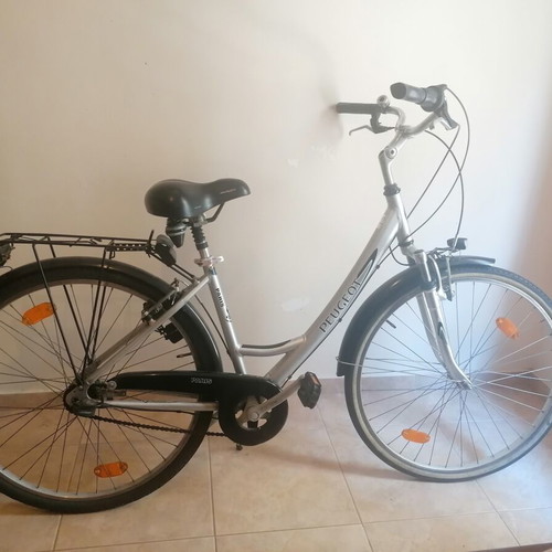 Peugeot Paris city bike used with 7005 aluminum frame and front suspension