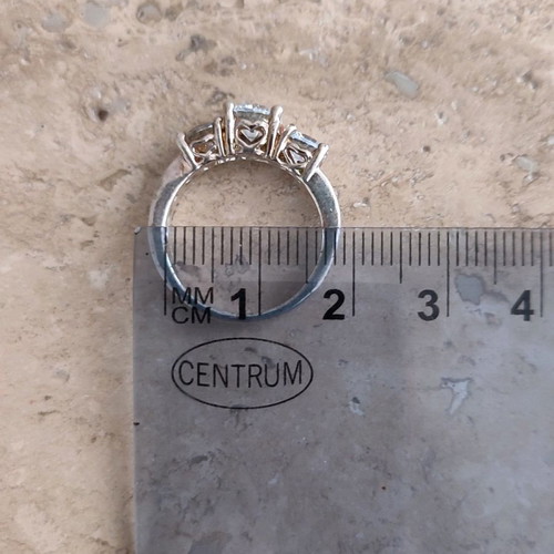 Trilogy silver plated ring used with zircon and heart motifs