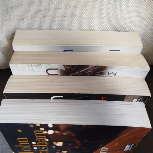 John Grisham book set like new, 4 titles in Greek