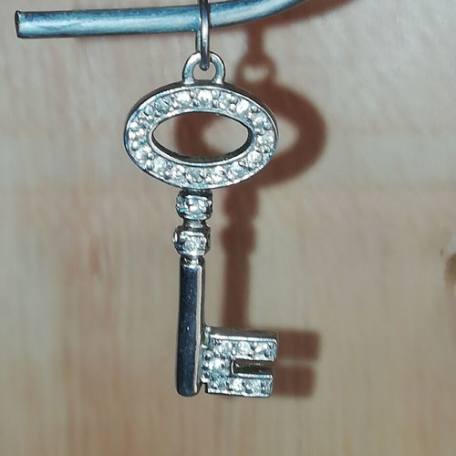 Steel necklace charm key silver color with clear zirconia new