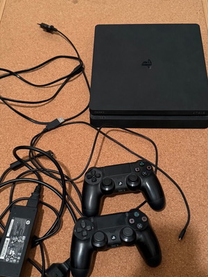 PlayStation 4 Slim 500GB like new with 2 controllers and 6 games