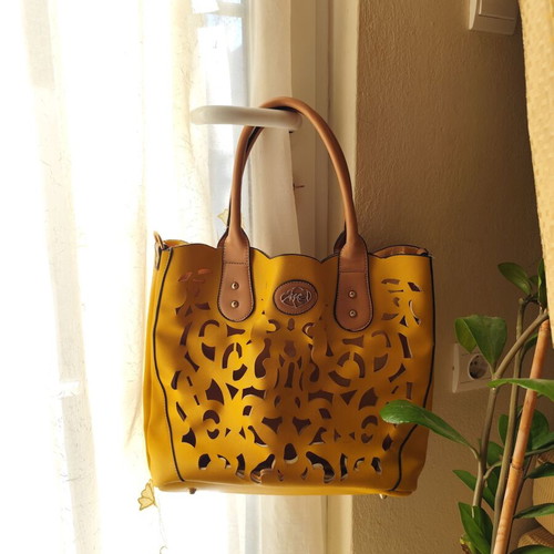 Yellow handbag used with beige details