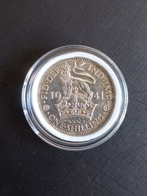 Silver British coin one shilling 1941 like new