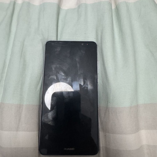 Huawei Mate 9 smartphone, cracked screen top left