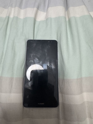 Huawei Mate 9 smartphone, cracked screen top left